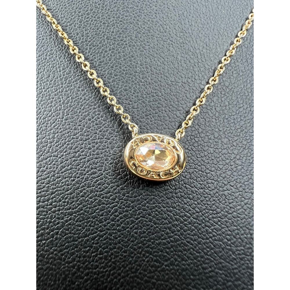 COACH Gold Signature Stone Pendant Necklace Champagne Yellow Crystal